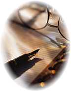 Picture of Spectacles and Pen on Paper